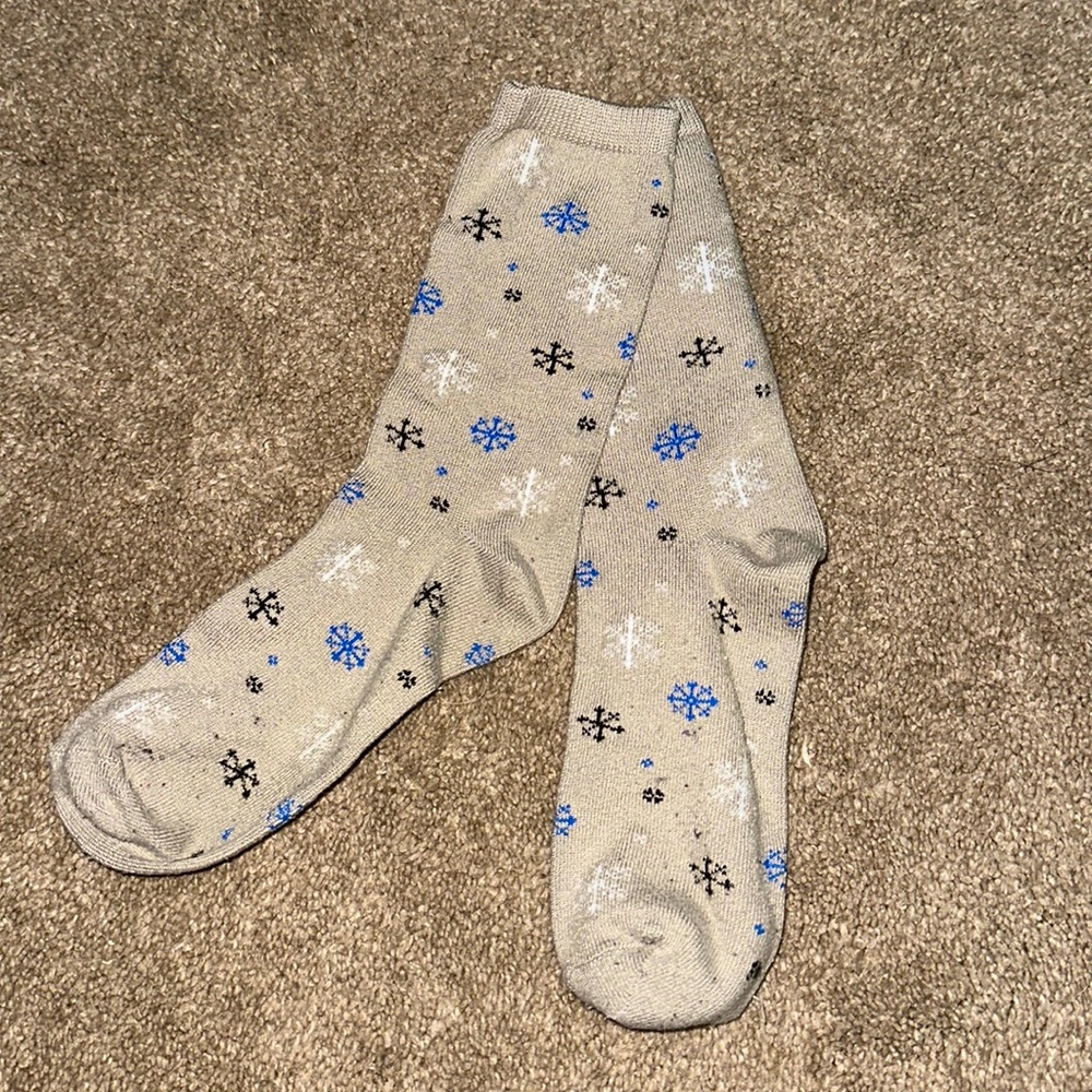 Grey snowflake socks. They go up to above your ankle, but not too tall.